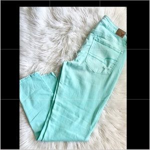AE 🦅 soft sea green distressed denim in size 12